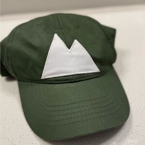 Green Cap with White Mountains